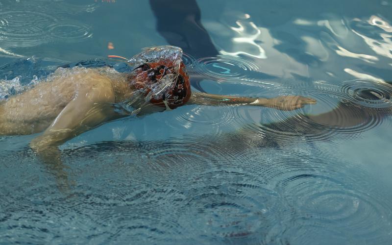 Elgin’s Noah Bronkema swims in the 50-yard freestyle race at the Class 5A state swim meet last week. HUGH SCOTT JR. | SOUTHWEST CHRONICLE