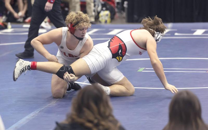 Elgin’s Colyn Donnelly, left, dominates his Collinsville opponent during the semifinal round of the Dual State Championships at Enid. Donnelly won by fall at 1:24 of the second period. HUGH SCOTT JR. | SOUTHWEST CHRONICLE
