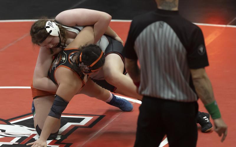Elgin’s Abigail Anglley tries to gain control of her opponent in the third-place match at 190 pounds during Tuesday’s Class 6A West Regional tournament at Mustang. Anglley lost the match but still advances to this week’s state tournament. HUGH SCOTT JR. | SOUTHWEST CHRONICLE