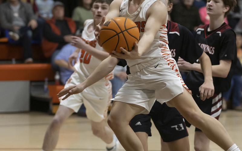 Tukker Hughes (10) drives toward the basket against Rush Springs last Friday. The 55-33 win for Sterling improved its record to 15-7.  HUGH SCOTT JR. | SOUTHWEST CHRONICLE