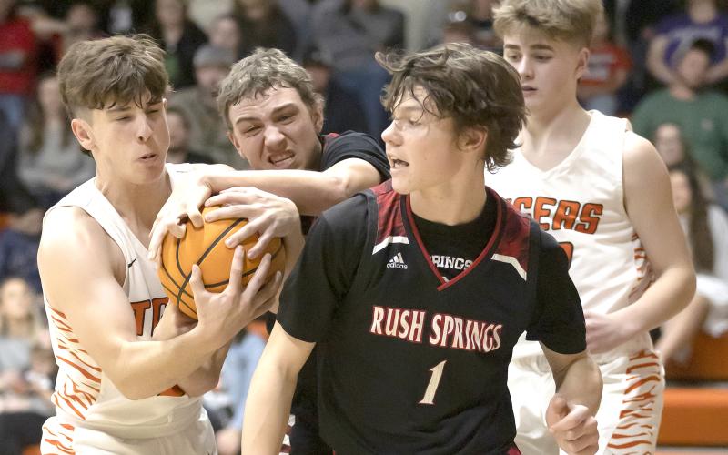 Tiger Clinton Moore wrestles the ball from a Rush Springs defender during a game earlier this season. Sterling starts district tournament play Friday at Velma-Alma. HUGH SCOTT JR. | SOUTHWEST CHRONICLE