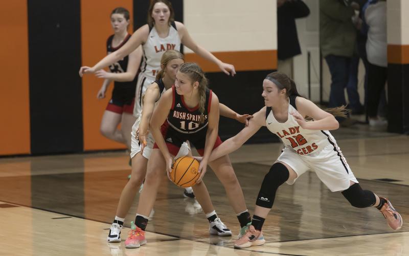 Lady Tiger Ava Alexander tries to steal the ball from a Rush Springs player during recent action. Sterling played a regional tournament game Thursday against Cordell. HUGH SCOTT JR. | SOUTHWEST CHRONICLE