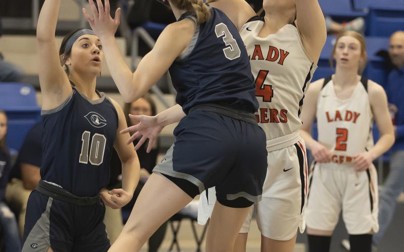 Sterling’s Kinley Mansel shoots over a defender during regional tournament action against Cordell. Sterling was eliminated from the Class A playoffs after losing to Okeene last week. HUGH SCOTT JR. | SOUTHWEST CHRONICLE