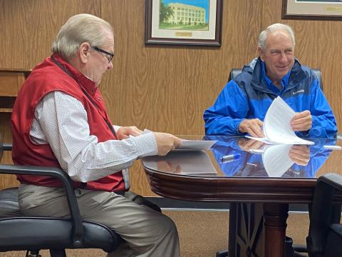 From the left, Comanche County Commissioners Johnny Owens and Gail Turner review documents during a commission meeting Monday at the Comanche County Courthouse. The commission took care of housekeeping matters, including forms for county employees who received premium pay under the American Rescue Plan Act.  Eric Swanson/Staff photo