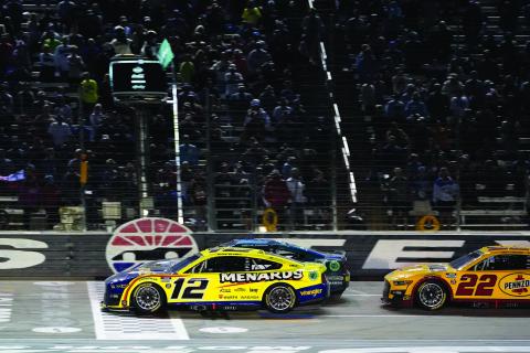Ryan Blaney (12), Austin Cindric (2) and Joey Logano (22) take the green flag for the final restart of the NASCAR All-Star auto race at Texas Motor Speedway in Fort Worth, Texas, Sunday, May 22, 2022.  (AP Photo/Larry Papke)