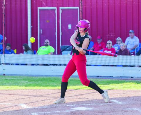 Photo by Rick Endicott SWINGING AWAY: Hanna Endicott takes a cut during the game against Cache on Friday, April 11.