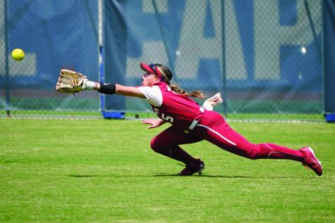Oklahoma’s Taylon Snow dives for a ball hit for a double by Oklahoma State’s Kiley Naomi in the third inning of the NCAA Big 12 Championship Saturday, May 14, 2022, in Oklahoma City.  AP Photo/Sue OgrockiOklahoma’s Taylon Snow dives for a ball hit for a double by Oklahoma State’s Kiley Naomi in the third inning of the NCAA Big 12 Championship Saturday, May 14, 2022, in Oklahoma City.  AP Photo/Sue Ogrocki