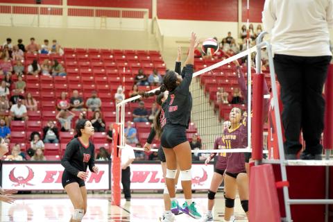 Amaya Rodriguez, right, tallies one of her 13 kills during Tuesday’s match at Clinton. Elgin won each set by scores of 25-17, 25-15 and 25-11. Photo by Rebecca Harvey