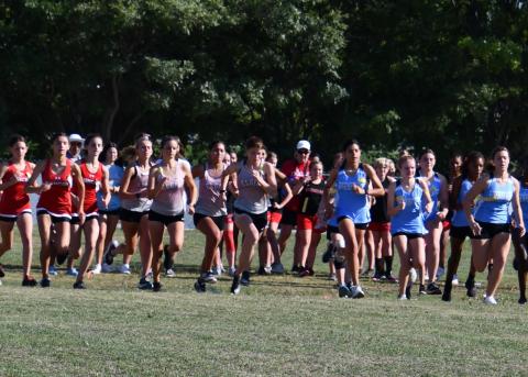 From left to right: Elgin cross country runners Hannah Shutts, Hannah Keahbone, Kendyl Marrero, Audrey McElhanney compete at the Cameron Invitational Sept. 7. Photo provided.