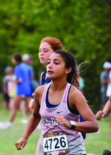  Elgin's Annelis Perez competes at a recent cross country meet. Perez finished 25th at the Newcastle Invitational with a time of 22:04. (Photo by Lisa Roberts)