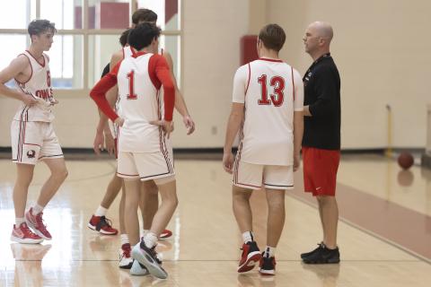 Elgin boys’ head coach Ryan Green instructs his players during a recent practice prior to the season opening game with Altus. PHOTO BY HUGH SCOTT JR..