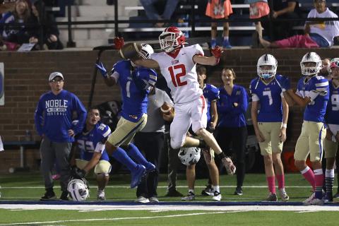 Elgin’s Toby Parker (12) bats the ball away from a Noble receiver during a game this season. Parker was named District 5A-1 Defensive Back of the Year by district coaches. Parker finished the season with four interceptions and more than 60 tackles. PHOTO BY HUGH SCOTT JR.