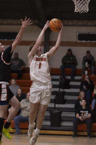 Sterling senior Hayden Taliaferro grabs a rebounds in a game against Apache in December. Taliaferro scored the winning bucket last Friday in a 64-62 win over Alex. HUGH SCOTT JR. | SOUTHWEST CHRONICLE