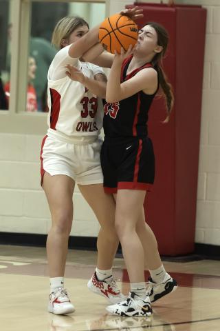 Freshman Kelby Carter grabs the ball from a Duncan opponent during action in mid-December. Carter scored 12 points during Elgin’s 59-21 win over Cache Tuesday night. HUGH SCOTT JR. | SOUTHWEST CHRONICLE