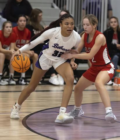 Lady Owl Kenley York guards a Bethany player during the Feb. 3 matchup. Bethany won the game, 64-29. Elgin broke a five-game losing streak Tuesday with a win over Chickasha. HUGH SCOTT JR. | SOUTHWEST CHRONICLE