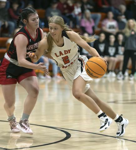 Sterling senior Emma Nunley (2) dribbles past a Rush Springs defender in last Friday’s win. Sterling is now 18-4 for the season.  HUGH SCOTT JR. | SOUTHWEST CHRONICLE
