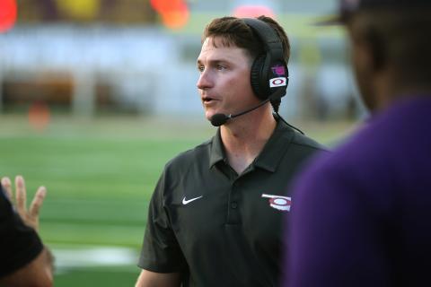 Elgin head football coach Chalmer Wyatt roams the sideline during a 2022 game. Wyatt, who was selected as Region 4 Coach of the Year, led the Owls to an 8-3 record and a spot in the playoffs for the first time in five years. HUGH SCOTT JR. | SOUTHWEST CHRONICLE